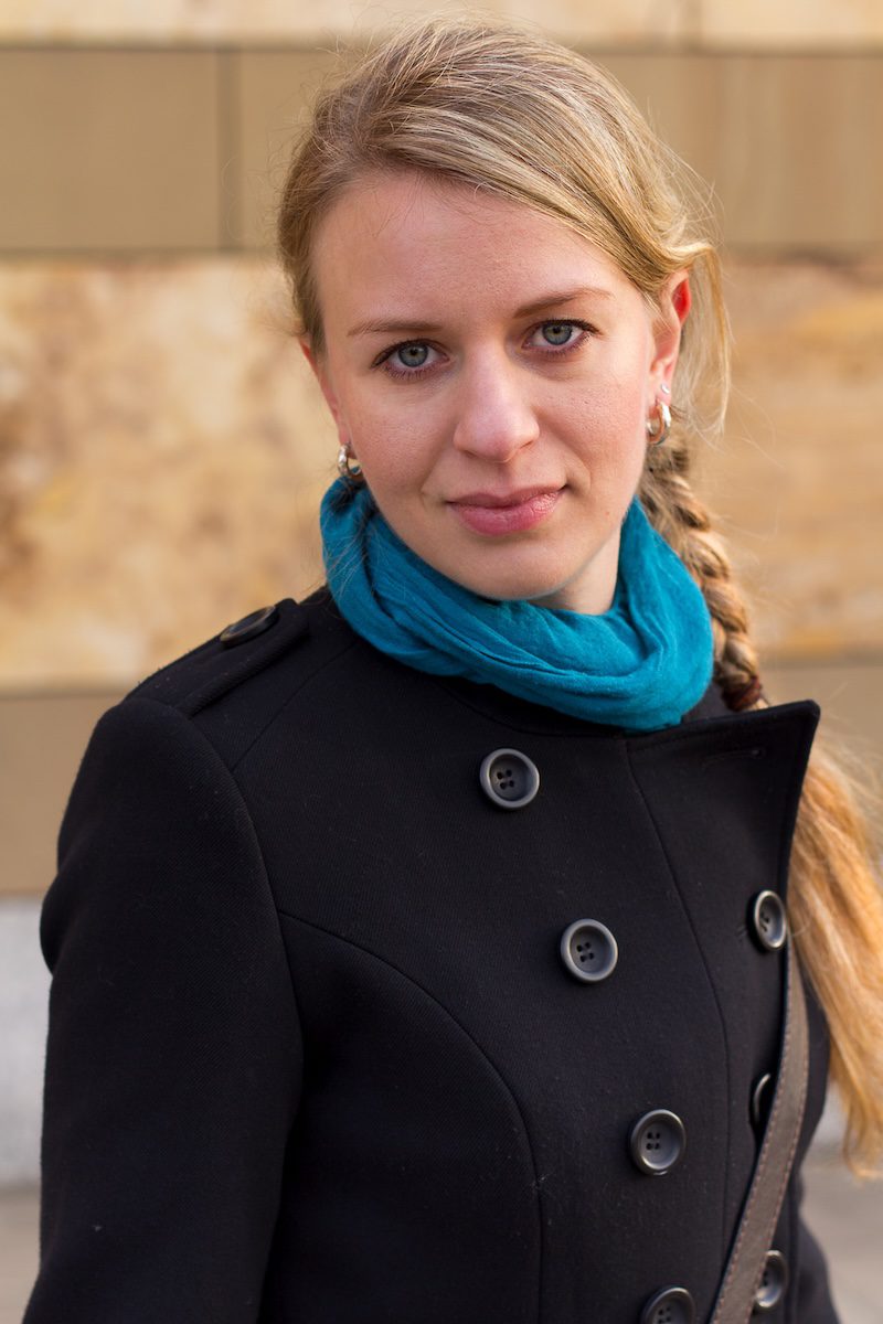 Julia Stivelman standing in front of wall