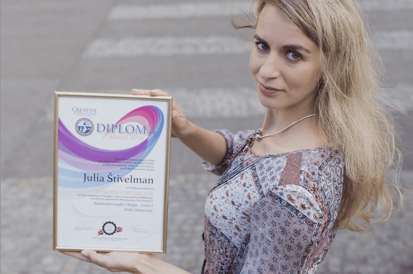 Julia holding certificate